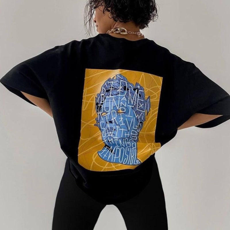 Camiseta informal holgada de manga corta con cuello redondo y estampado gráfico para mujer