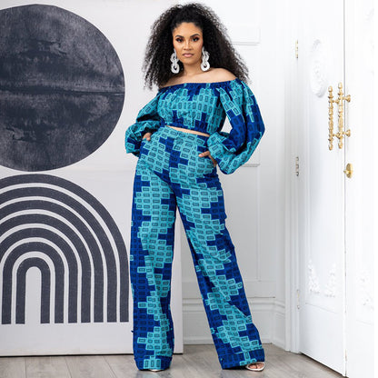 Conjunto informal de dos piezas con top de manga larga y pantalones holgados de cintura alta con cuello barco estampado para mujer de talla grande
