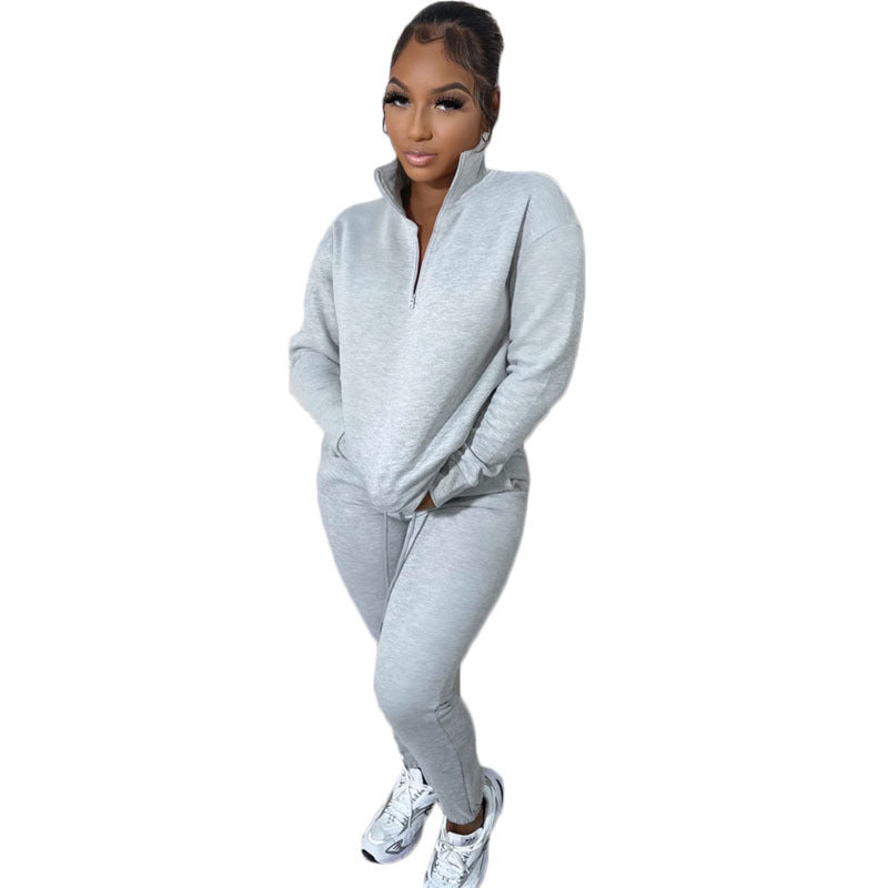 Conjunto deportivo informal de dos piezas para mujer, sudadera y pantalones de manga larga con cremallera y cuello alto en color liso