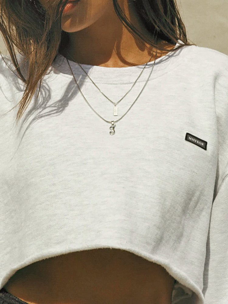 Sudadera corta informal de manga larga con cuello redondo y color liso para mujer