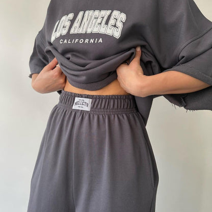 Conjunto de sudadera y pantalones de manga corta con estampado de letras y nombre de ciudad para mujer