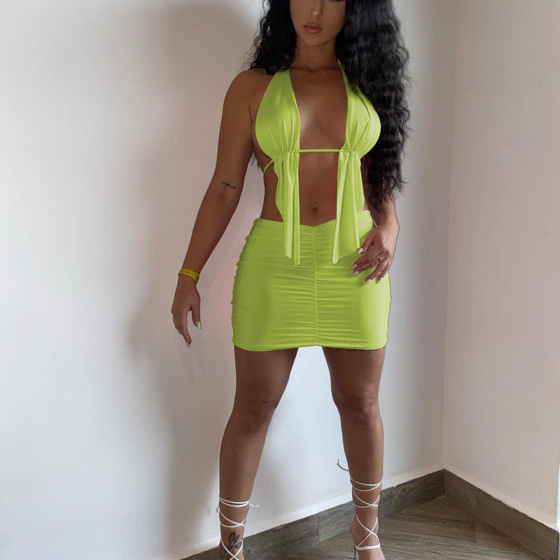 Conjunto de dos piezas de top y falda irregulares con tirantes halter de color liso para mujer