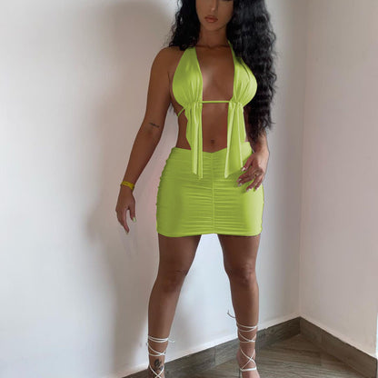 Conjunto de dos piezas de top y falda irregulares con tirantes halter de color liso para mujer