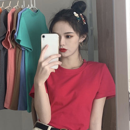 Camiseta informal de manga corta con cuello redondo y color liso para mujer