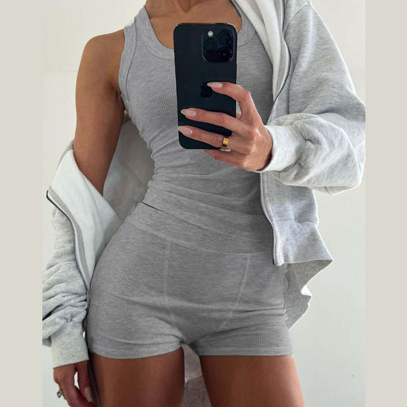 Conjunto de dos piezas formado por camiseta sin mangas y pantalones cortos de cintura alta, cuello redondo, color liso e informal, para mujer