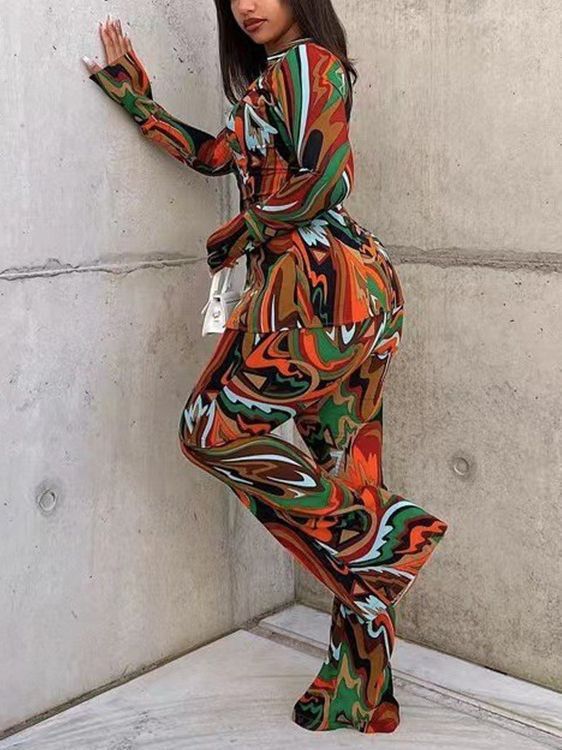 Conjunto de dos piezas de blusa holgada informal con escote en V profundo y botonadura sencilla para mujer, con pantalones anchos estampados sexys.