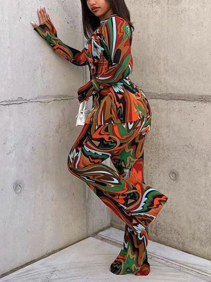 Conjunto de dos piezas de blusa holgada informal con escote en V profundo y botonadura sencilla para mujer, con pantalones anchos estampados sexys.