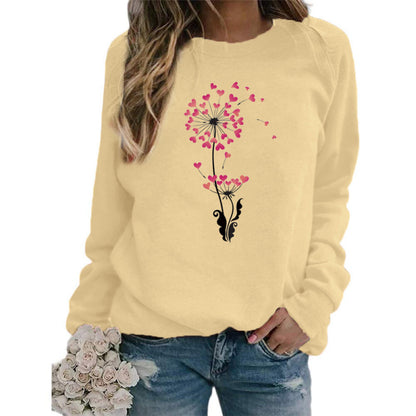 Sudadera holgada informal con estampado de diente de león y corazón para mujer, cuello redondo y manga larga