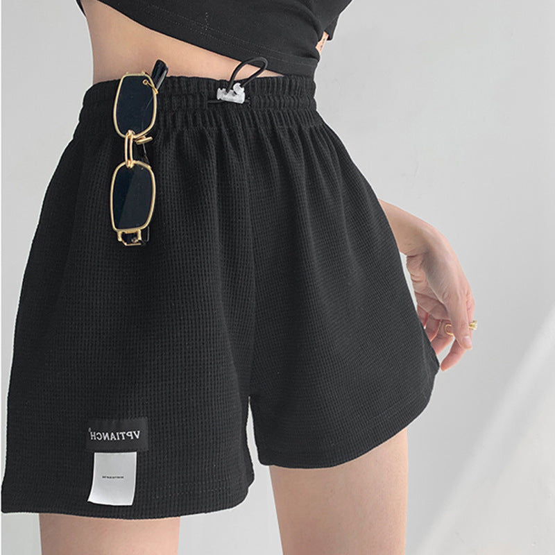 Pantalones cortos casuales de pierna ancha de color liso para mujer