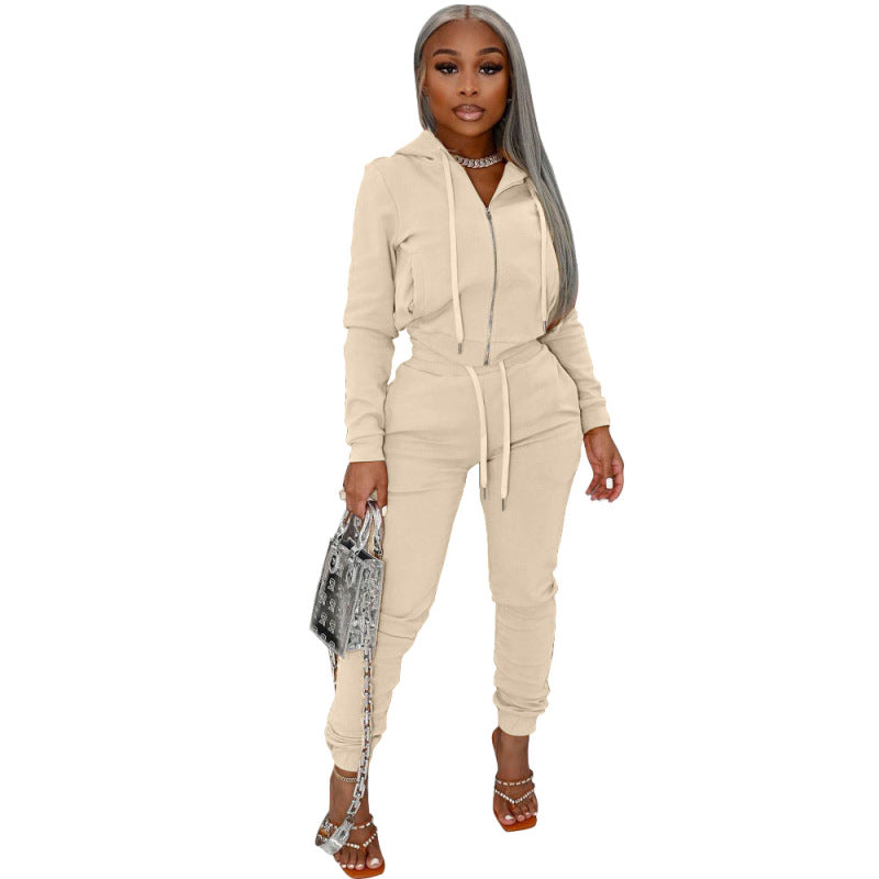 Conjunto deportivo informal de top y pantalón de manga larga con capucha y cremallera de color liso para mujer