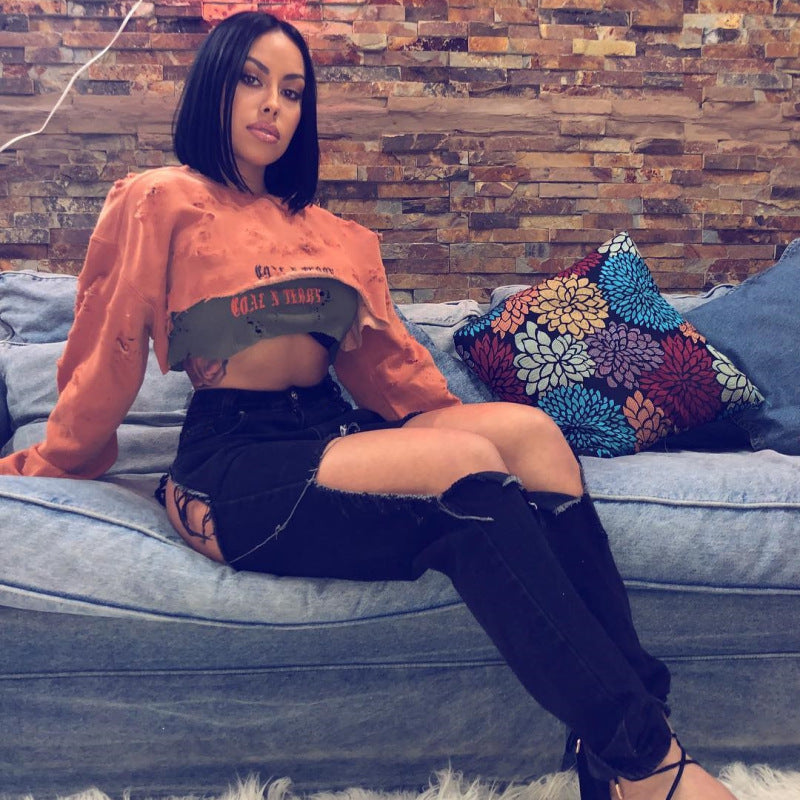 Vaqueros ajustados rotos con borlas informales de moda para mujer