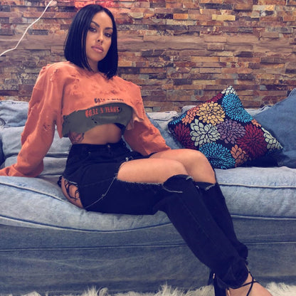 Vaqueros ajustados rotos con borlas informales de moda para mujer