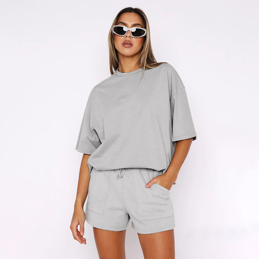 Conjunto de dos piezas de pantalones cortos de manga corta de color liso informal a la moda para mujer