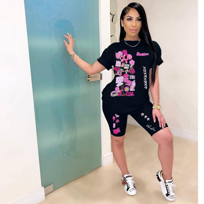 Conjunto de dos piezas de camiseta y pantalones cortos de manga corta con estampado gráfico informal a la moda para mujer