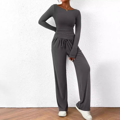 Conjunto deportivo informal de otoño e invierno con camiseta asimétrica de manga larga y pantalones anchos