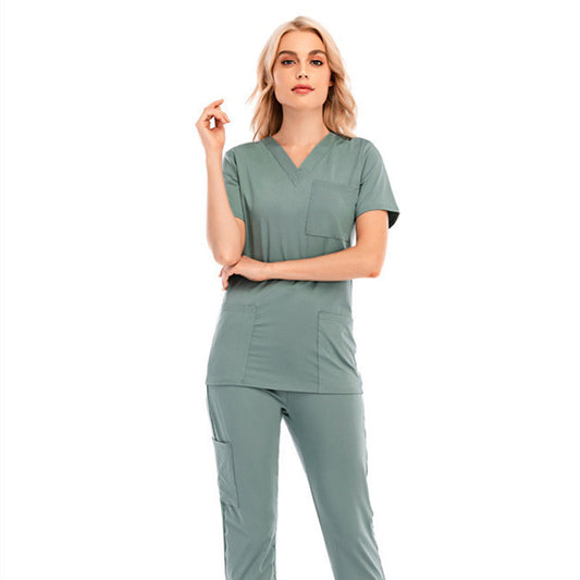 Conjunto de enfermera informal de color sólido con cuello en V, manga corta y bolsillo