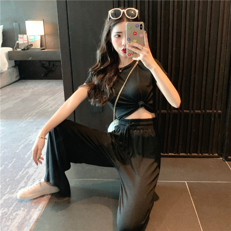 Conjunto de dos piezas de top y pantalón de manga corta de color liso informal para mujer