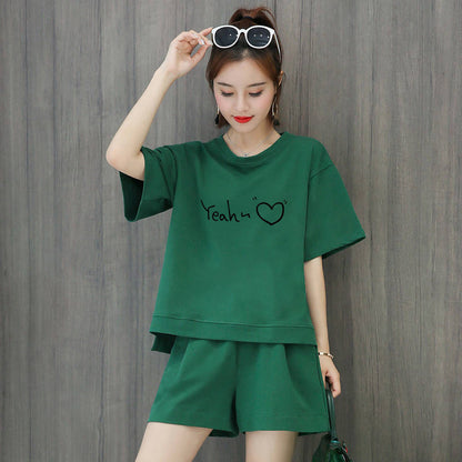 Conjunto de 2 piezas de camiseta de manga corta con cuello redondo, pantalones cortos y cintura definida, estampado de color liso y holgado para mujer