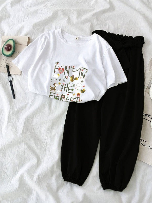 Conjunto de dos piezas de camiseta y pantalones deportivos de manga corta con cuello redondo y color liso para mujer