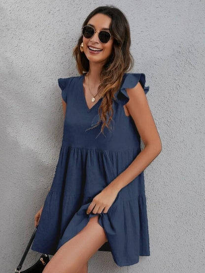 Vestido informal de mujer con cuello en V, mangas con volantes y costuras de color liso