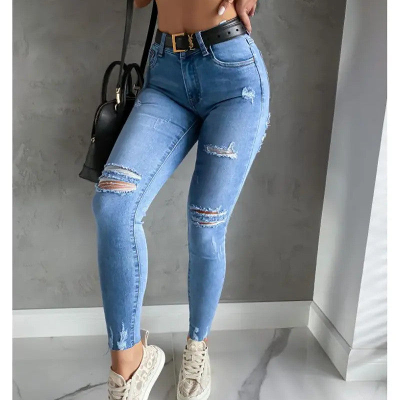 Vaqueros ajustados, rotos y de moda informal para mujer