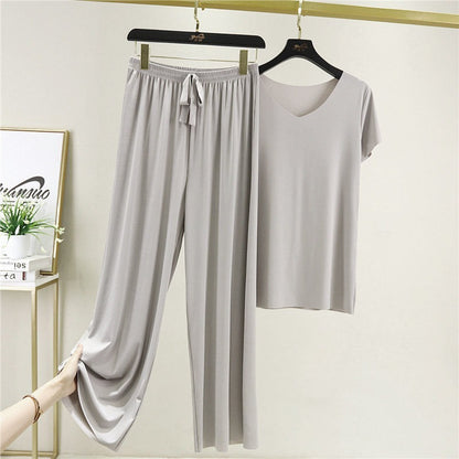 Conjunto de dos piezas de camiseta y pantalón de seda helada de color liso informal para mujer
