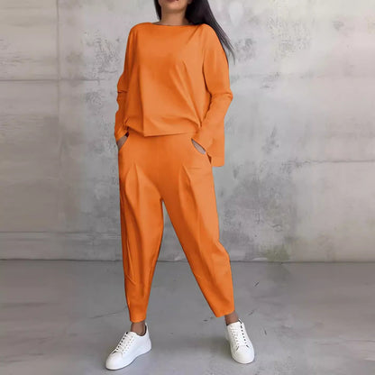 Conjunto de dos piezas de top y pantalón de manga larga con cuello redondo y color liso para mujer