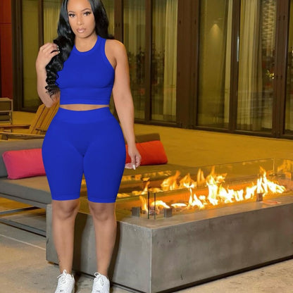 Conjunto deportivo de dos piezas para mujer, de verano, con camiseta sin mangas y pantalones cortos de color liso