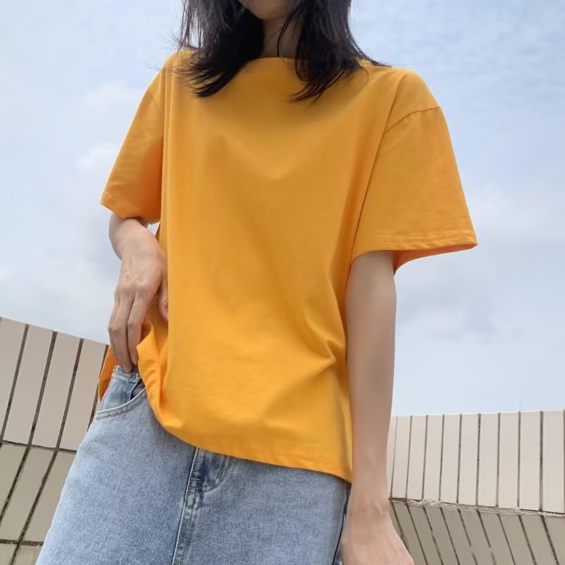 Camiseta básica holgada informal de color liso con cuello redondo para mujer