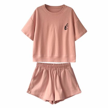 Conjunto de 2 piezas de camiseta de manga corta con cuello redondo, pantalones cortos y cintura definida, estampado de color liso y holgado para mujer