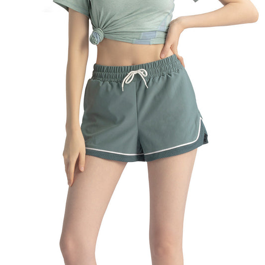 Pantalones cortos deportivos informales para correr, elásticos, antidecoloración, de dos piezas, sueltos y falsos para mujer