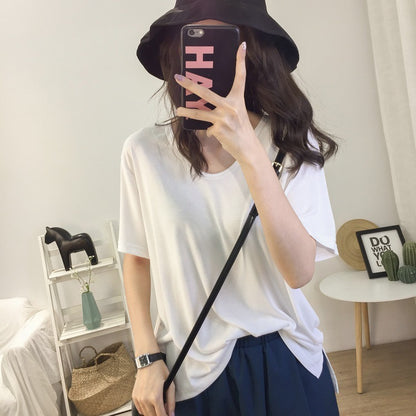 Camiseta holgada informal de color liso con cuello en V y manga corta para mujer