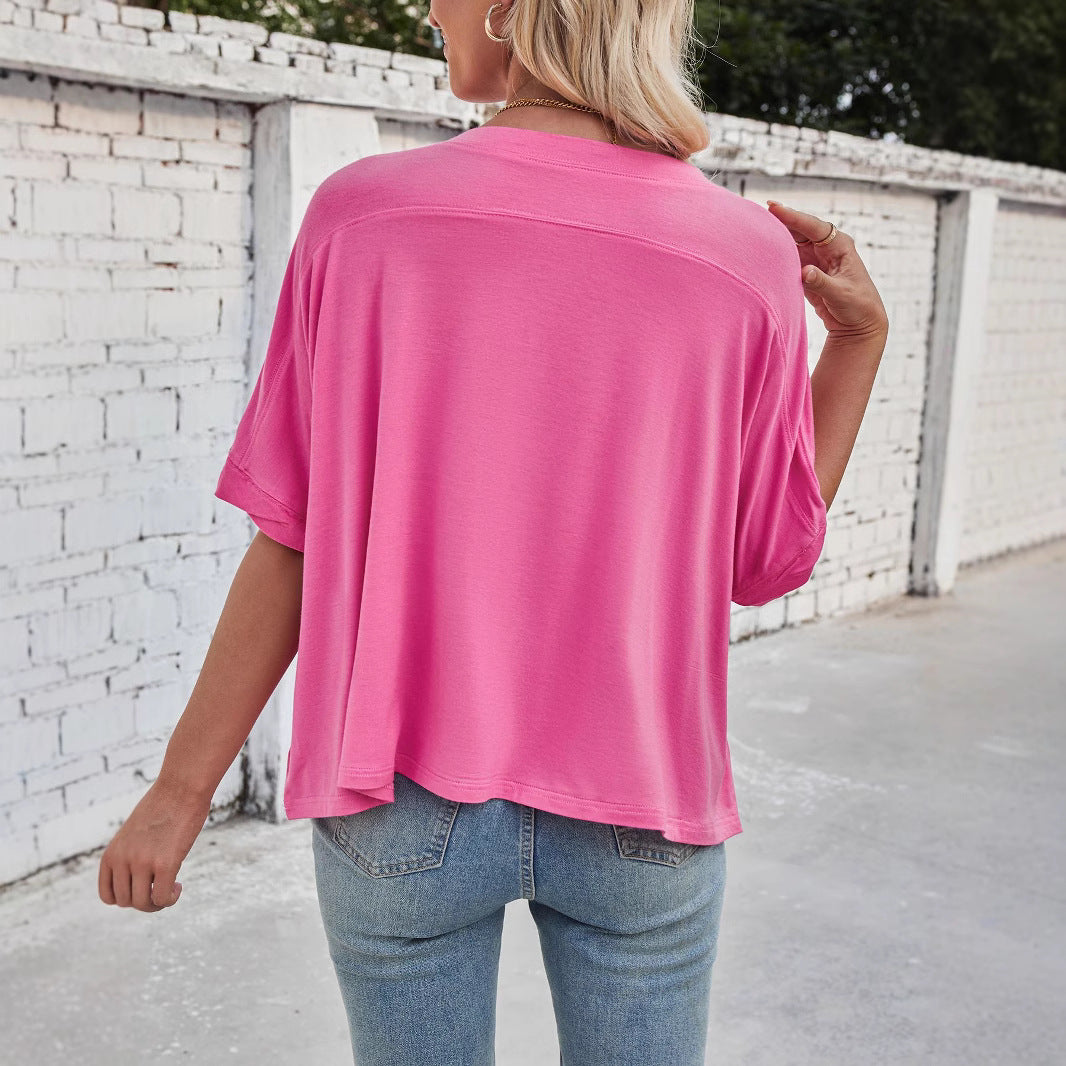 Camiseta informal holgada de manga corta con cuello redondo y estampado de murciélago para mujer