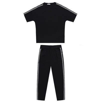 Conjunto de dos piezas de top y pantalón de manga corta con cuello redondo y rayas informales a la moda para mujer