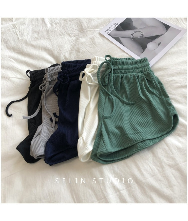 Pantalones cortos holgados casuales de color sólido para mujer
