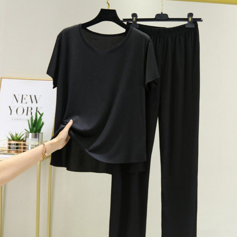 Conjunto de dos piezas de camiseta y pantalón de seda helada de color liso informal para mujer