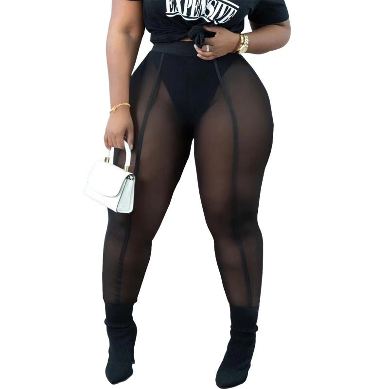 Conjunto de dos piezas de camiseta informal de manga corta con cuello redondo y leggings de malla transparente sexys para mujer