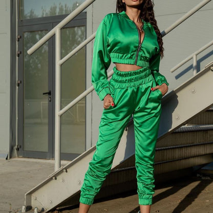 Conjunto de dos piezas de chaqueta y pantalones deportivos de manga larga con cremallera de color liso informal para mujer