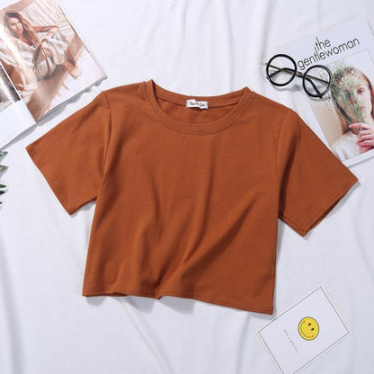 Camiseta básica de verano para mujer, de manga corta, color liso, con cuello redondo y cintura alta, informal, holgada