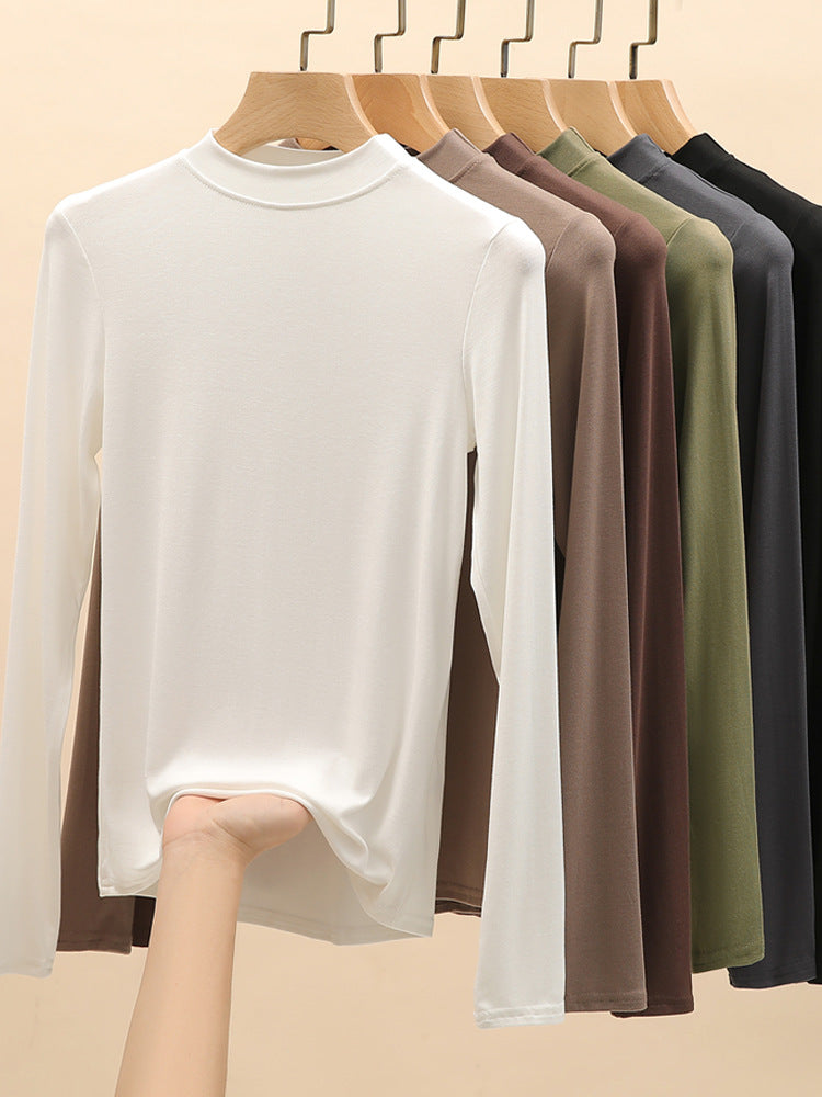 Camiseta informal de manga larga con cuello redondo, color liso y media caña para mujer