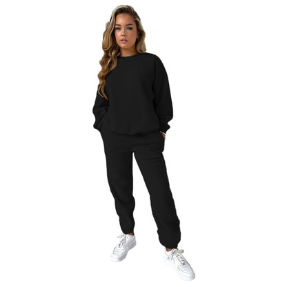 Conjunto informal de dos piezas con top y pantalón holgado de manga larga y cuello redondo de color liso para mujer