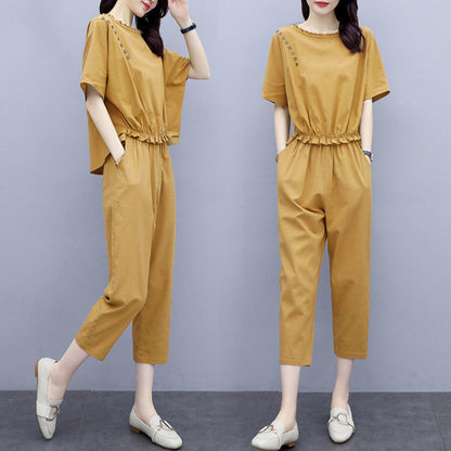 Conjunto de dos piezas formado por top y pantalón de manga corta y cuello redondo, informal, a la moda para mujer