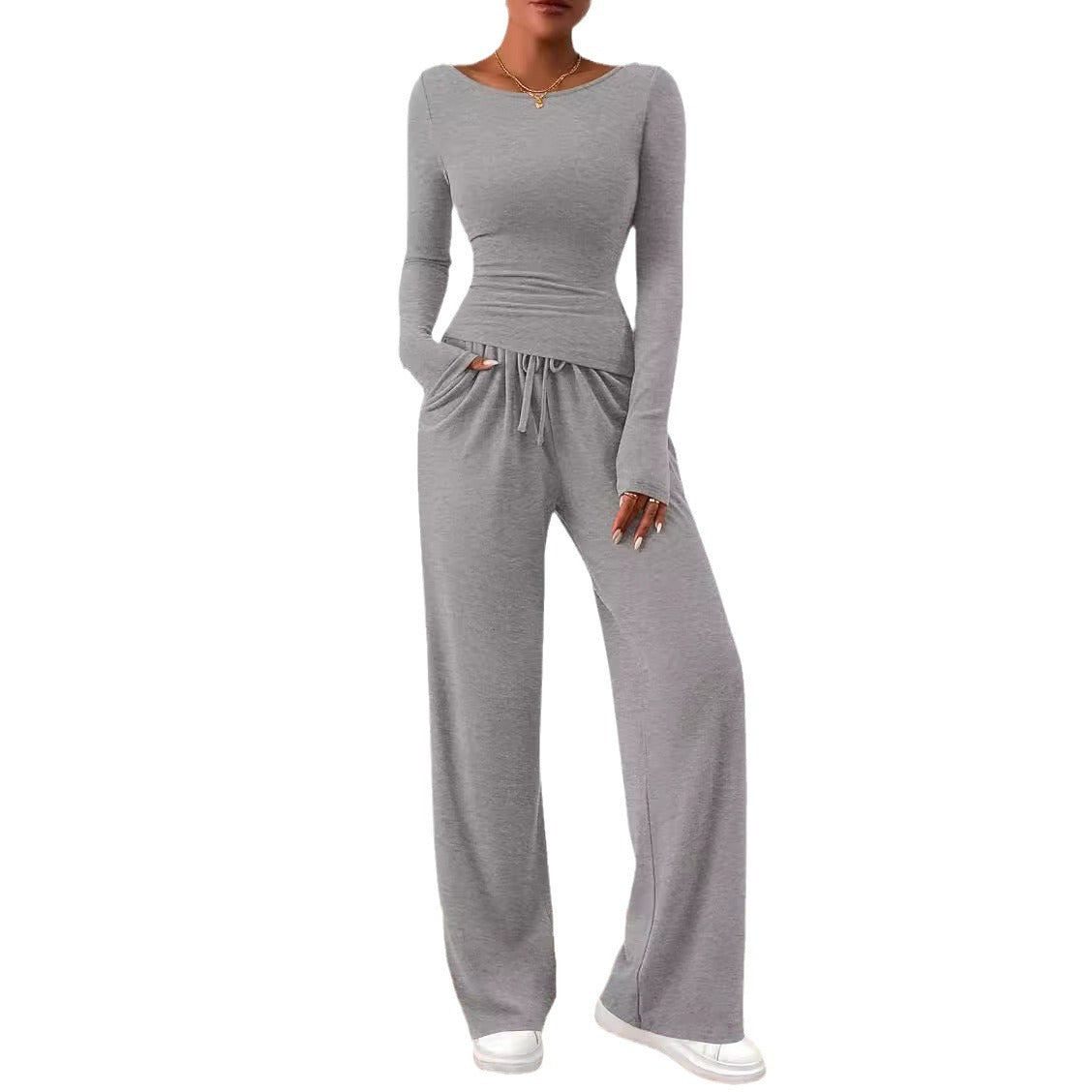 Conjunto deportivo informal de otoño e invierno con camiseta asimétrica de manga larga y pantalones anchos