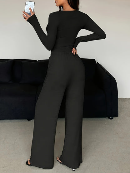 Conjunto de dos piezas de camiseta y pantalones holgados de manga larga ajustados de color liso para mujer