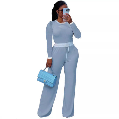Conjunto de dos piezas informal de mujer para uso diario, con cuello redondo, manga larga y pantalón de punto acanalado en contraste de color