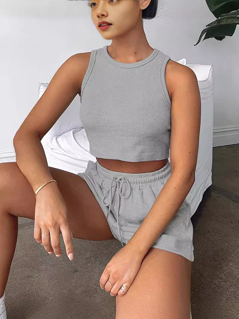 Conjunto de dos piezas formado por camiseta sin mangas y pantalones cortos con cordón, color liso, informal, a la moda de verano para mujer