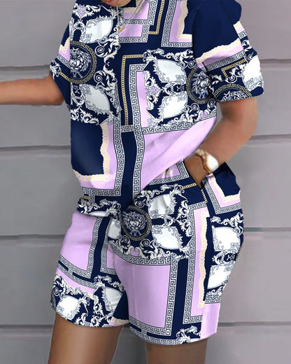 Conjunto de dos piezas de top y pantalones cortos de manga corta con cuello redondo y estampado gráfico informal para mujer