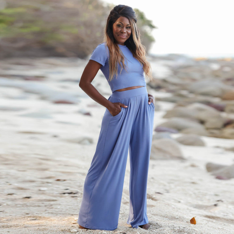 Conjunto de dos piezas de top de manga corta y pantalón ancho de color liso informal de verano para mujer