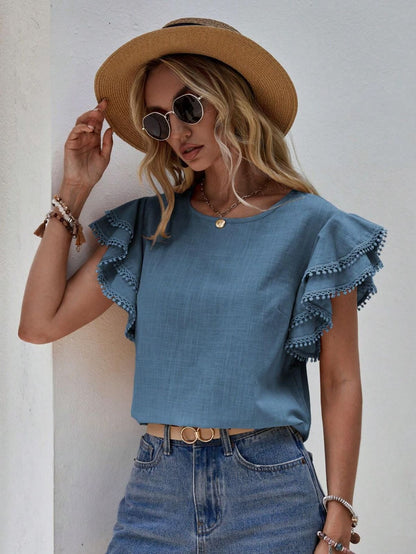 Blusas casuales de color sólido con cuello redondo y volantes para mujer