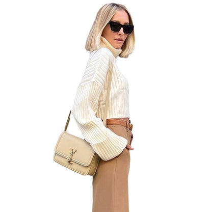 Suéter de cuello alto a rayas de color liso informal de moda para mujer Otoño Invierno